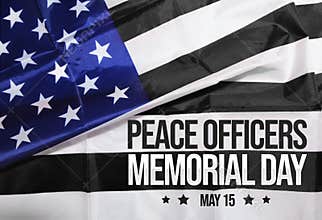 Peace Officers Memorial Day Wallpaper with Typography and flag in the backdrop.