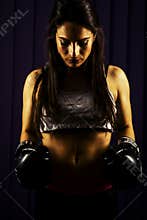 Fitness woman with boxing gloves