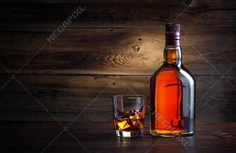 Bottle and glass of whiskey