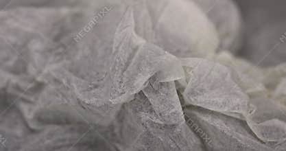 thin paper made of cellulose as a packaging material for clothing