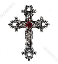 Isolated photo of silver engraved decorative cross pendant on white background