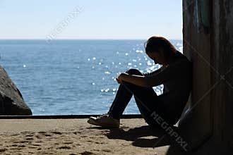 Teen girl lonely and sadness on the beach