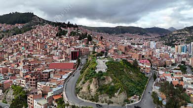 La Paz, Bolivia, aerial view flying over the dense, urban cityscape.