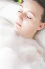 Young woman in her bath