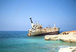 Abandoned ship Edro III near Cyprus beach. Rusty ship ran aground near shore