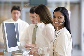 Call center with smiling woman
