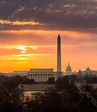 Fiery sunrise over monuments of Washington