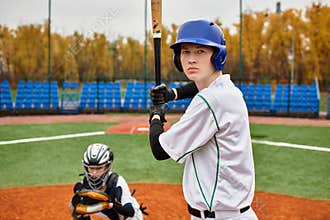 Teenage boys engage in spirited baseball