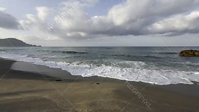 Ocean waves beach. Cliffside coastline