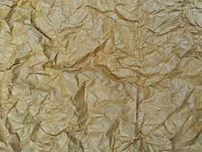 Abstrack crumpled brown paper texture surface background