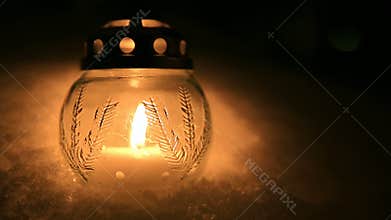 Christmas candle light in snow