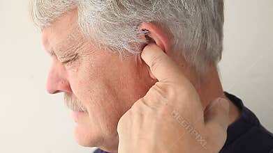 Man with pain in ear