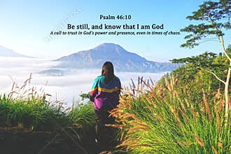 Bible verse quote - Be still, and know that I am God. Psalm 46:10 With woman standing alone between the green tall grass