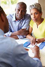 Mature Black Couple Meeting With Financial Advisor