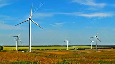 Wind turbines on field