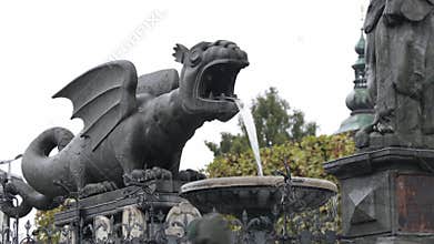 Lindwurmbrunnen Fountain (Lindworm Fountain) during daytime in Neuer Platz, Klagenfurt, Austria