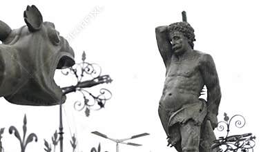 Historical Lindworm Fountain and Statue (Lindwurmbrunnen) on a cloudy day in Klagenfurt, Austria