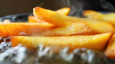 Steaming Golden Potato Wedges in Dark Pan