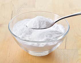 Close-up of baking soda on spoon.