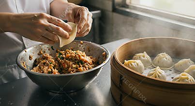 Hands Shaping Dumplings: A Culinary Close-Up