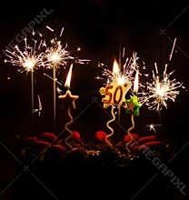 50th birthday celebration cake sparklers candles
