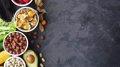 Healthy eating ingredients: fresh vegetables, fruits and superfood. Nutrition, diet, vegan food concept.