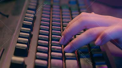 Close up female hand typing computer keyboard unknown woman business working online internet e-learning hacker