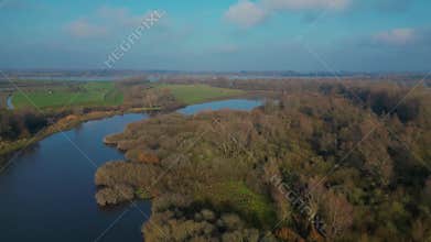 Dutch landscape with rivers and lakes seen from above in sunny spring weather 4k