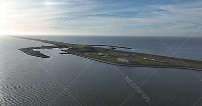 The Afsluitdijk, Breezanddijk, The Netherlands, on the former work island of Breezand, gas station, small harbour, aerial drone