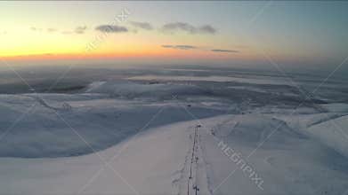 The vast snow-capped mountains and ski resorts of Kipling on the Kola Peninsula in Russia