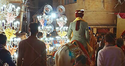 Agra, Uttar Pradesh, India. Indian Hindu Wedding Procession Of Baraat, With Bridegroom On Horse, Led By Brass Band