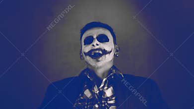 Creepy joker laughing