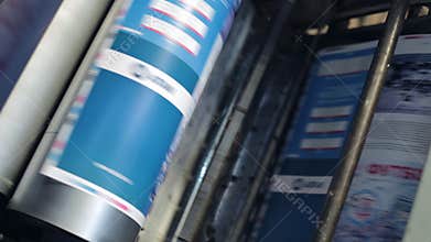 Printing machine passes paper through cylinders