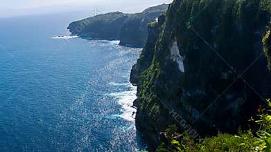 Steep Limestone Coastline Above Sparkling Tropical Sea