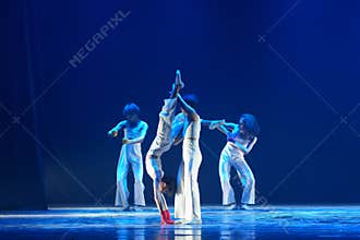 Acrobatic Contemporary Dance Lift During Live Theater Performance