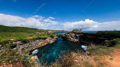 Coastal Limestone Bridge Above Clear Tropical Lagoon