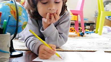 Children draw in home