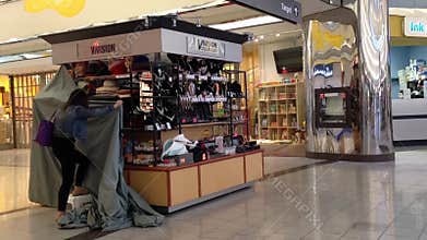 Closing shop booth at night