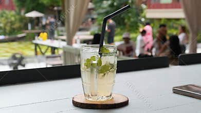 Mint lime refreshing drink lemonade with ice served in glass mug in Phuket, Thailand. Mojito mocktail. Summer