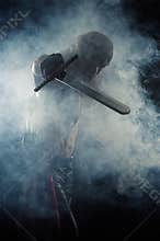 Man hit a sword in smoke