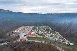 VELIKO TARNOVO, BULGARIA - MARCH 15, 2022: High angle landscape view towards Trapezitsa Hill from Tsarevets