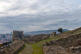 VELIKO TARNOVO, BULGARIA - MARCH 15, 2022: Ancient stone pathway and fortified walls at Tsarevets Hill