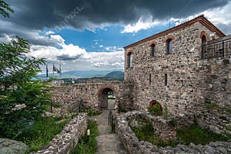 BULGARIA: Medieval stone church building with ancient walls on hill