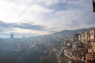 VELIKO TARNOVO, BULGARIA - MARCH 15, 2022: Traditional Revival period houses on cliffside in Old Town