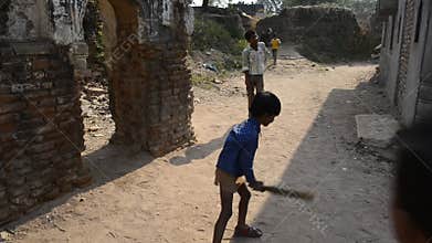 Poor children have a lot of fun playing cricket