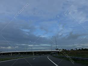 Amsterdam Highway Driving at Sunset with Bridge Infrastructure, Traffic and