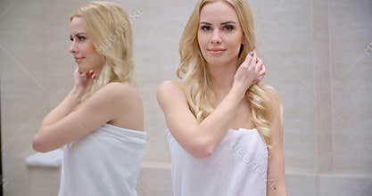 Beautiful Blond Girl in Her Bathroom