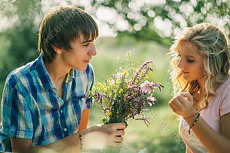 Teenage couple dating on picnic