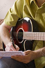 Songwriting on acoustic guitar