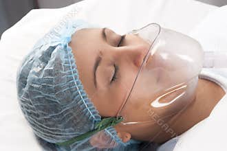 Beautiful patient receives anaesthetic